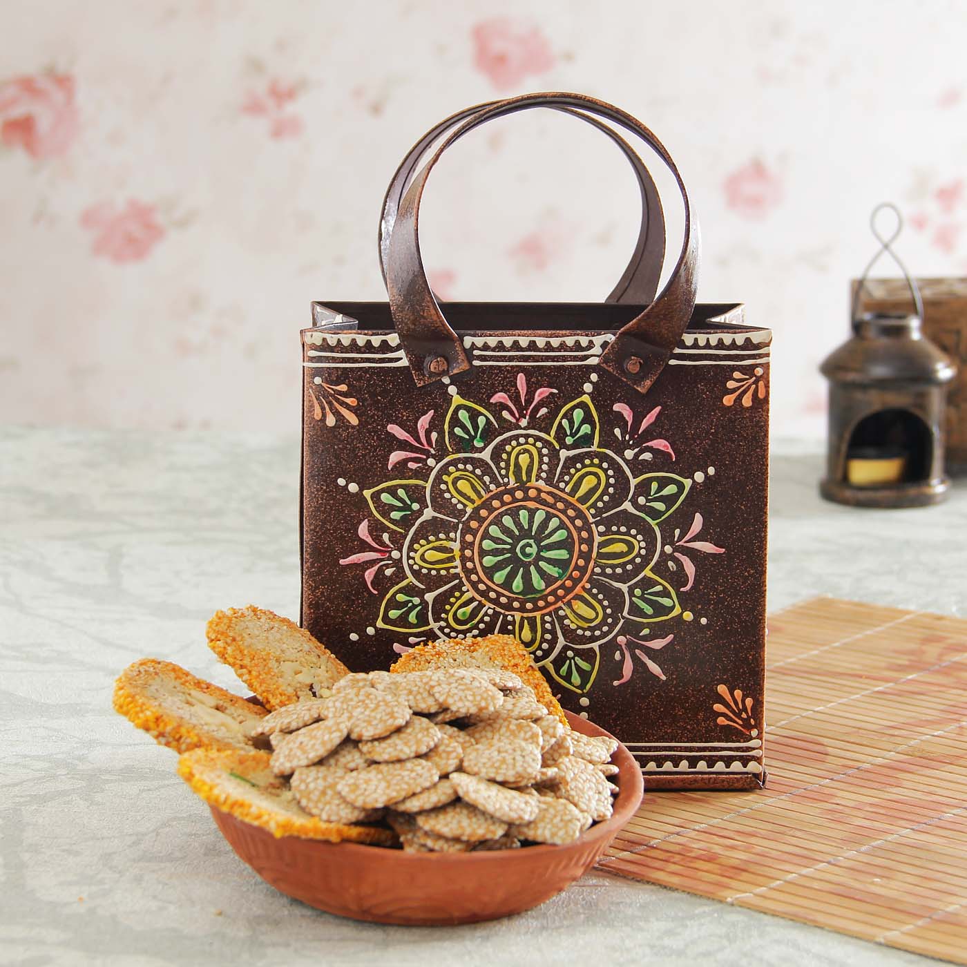 gur rewri with mango kaju gajak iron bucket