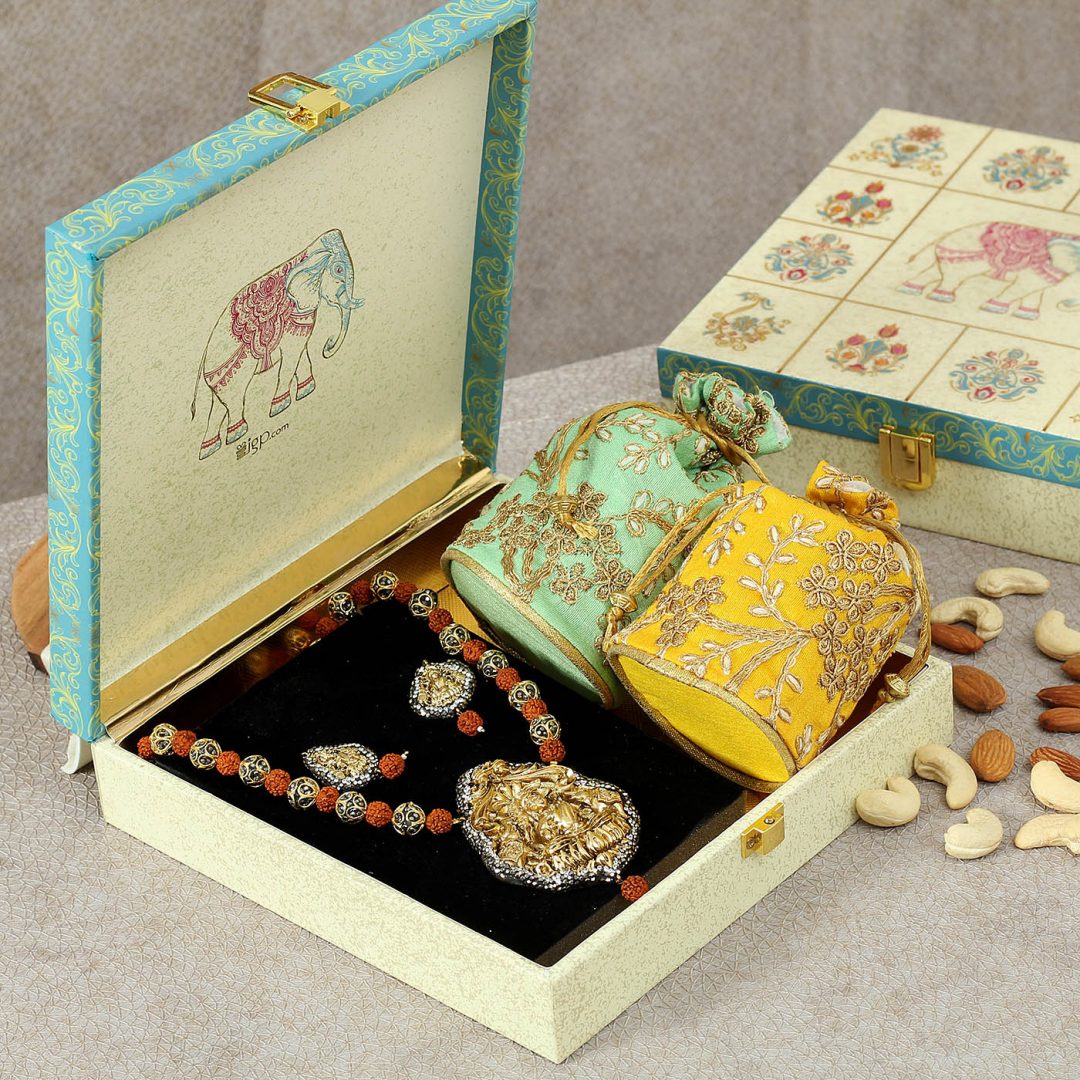 Hamper of Ethnic Jewellery & Cashew Potli in Designer Box